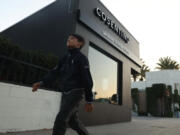 A young boy walks by the Cosentino store on Monday, Oct. 14, 2024 in Los Angeles, Calif.