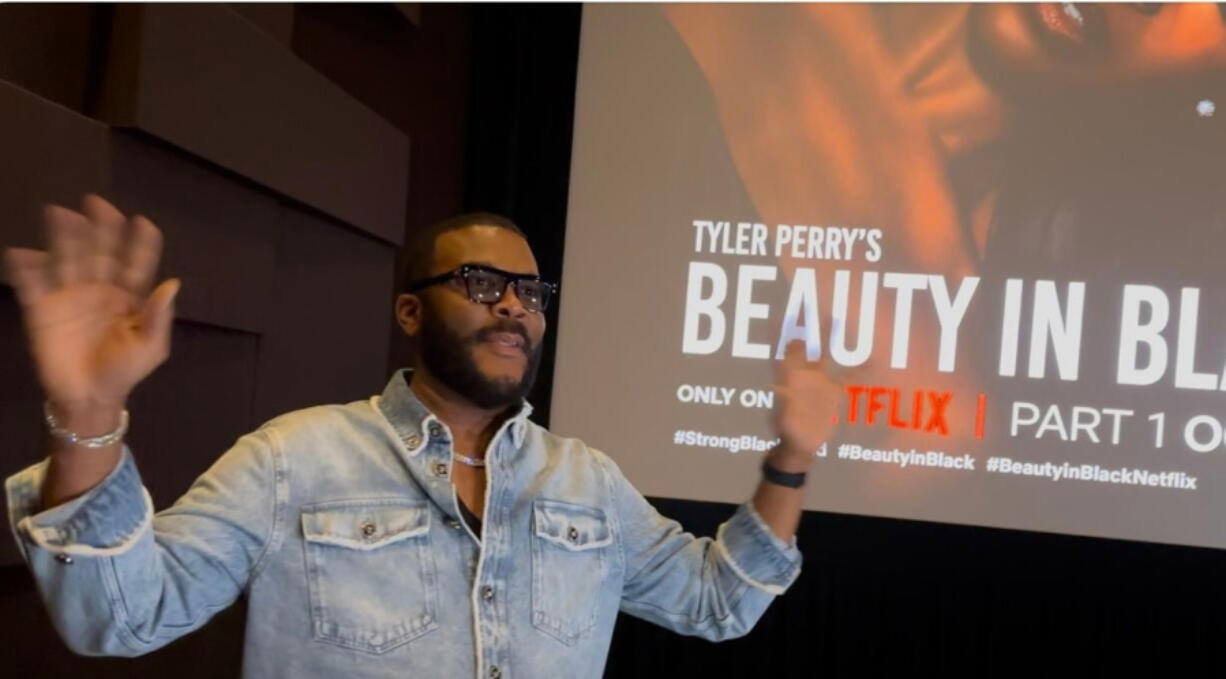 Tyler Perry attends an Oct. 21 screening of his new Netflix show &ldquo;Beauty in Black&rdquo; in Atlanta. The show stars Atlanta actor Taylor Polidore Williams.