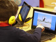 A student works on a computer Feb. 10, 2021, at Freedom Preparatory Academy in Provo, Utah.