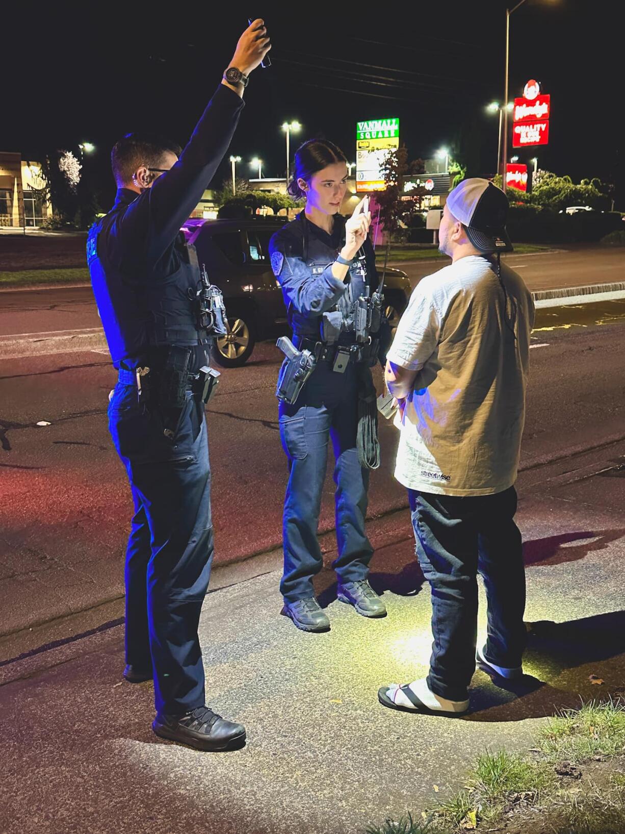 Vancouver police conduct a roadside sobriety test on a driver in Vancouver this month. Vancouver police officers are being trained as phlebotomists so they can draw blood from suspected intoxicated drivers at the traffic stop.