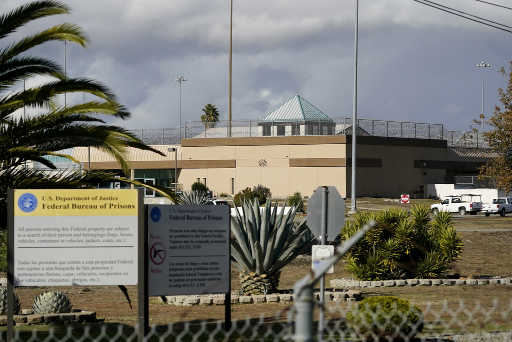 FILE - The Federal Correctional Institution stands in Dublin, Calif., Dec. 5, 2022.  The federal Bureau of Prisons says it is planning to close a women’s prison in California known as the “rape club” despite attempts to reform the troubled facility after an Associated Press investigation exposed rampant staff-on-inmate sexual abuse.