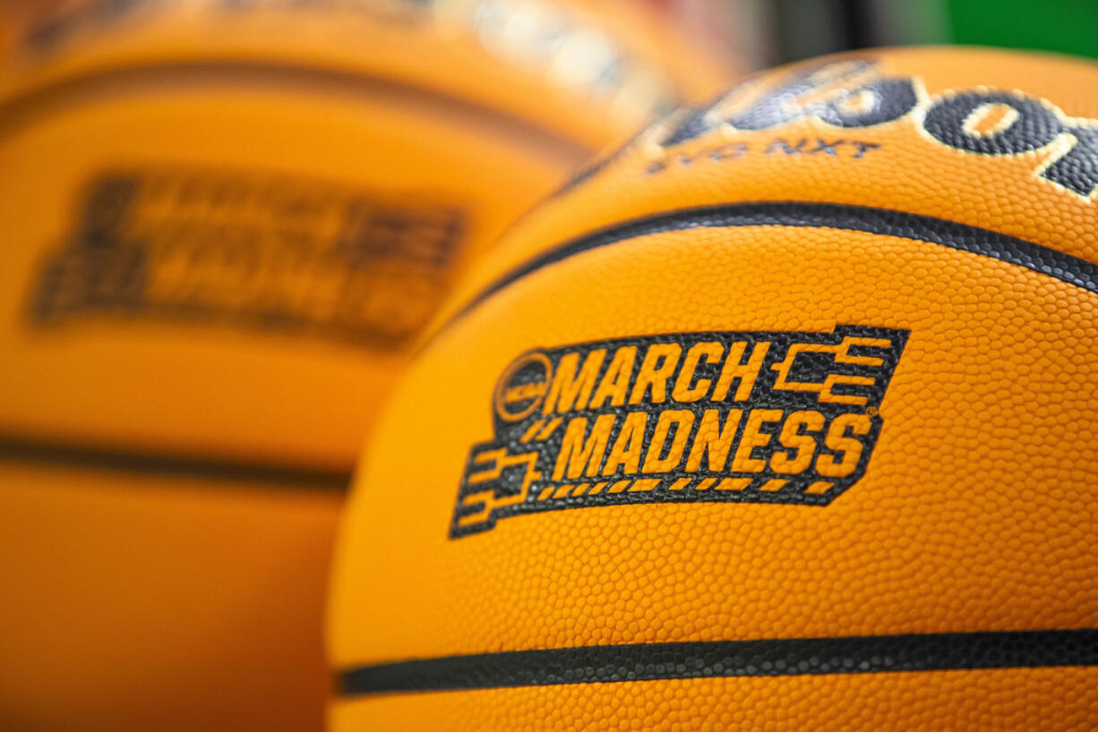 March Madness branding is displayed a Wilson EVO NXT basketball.