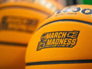 March Madness branding is displayed a Wilson EVO NXT basketball.