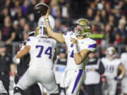 Washington quarterback Will Rogers (7) throws a pass during the first half of an NCAA college football game against Rutgers, Friday, Sept. 27, 2024, in Piscataway, N.J.