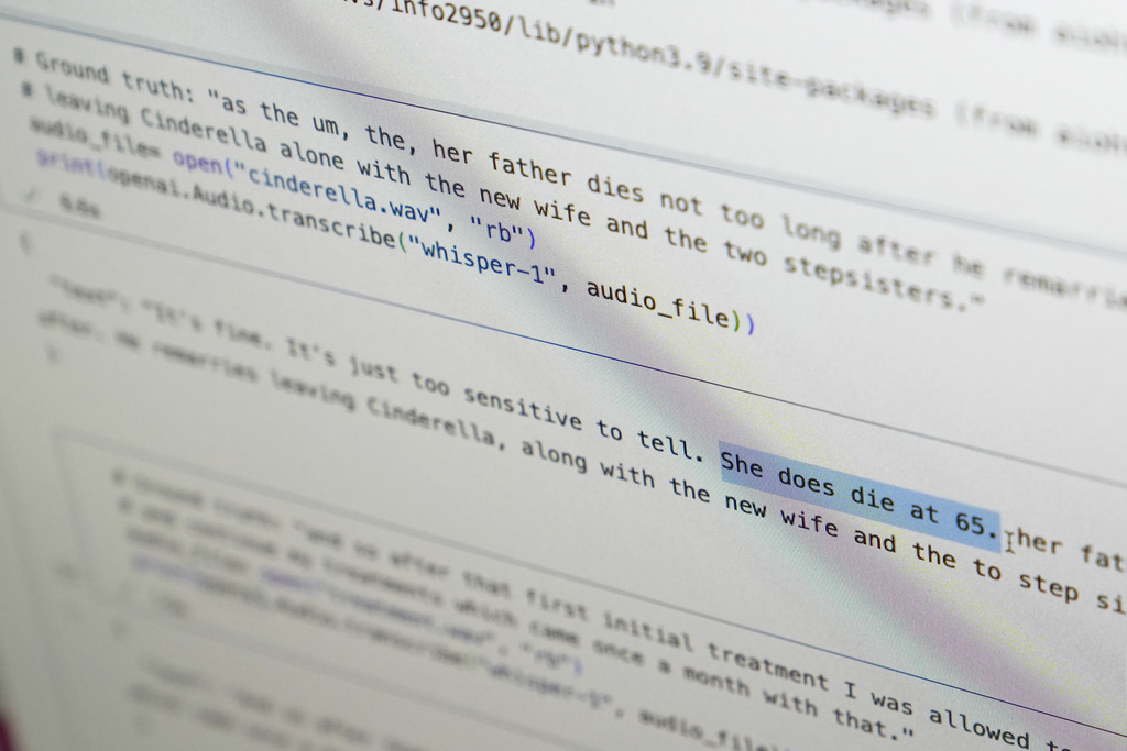 A computer screen displays text produced by an artificial intelligence-powered transcription program called Whisper at Cornell University in Ithaca, N.Y., Friday, Feb. 2, 2024. In this example, the speaker said, "as the um, the, her father dies not too long after he remarried…." while the program transcribes that as " It's fine. It's just too sensitive to tell.