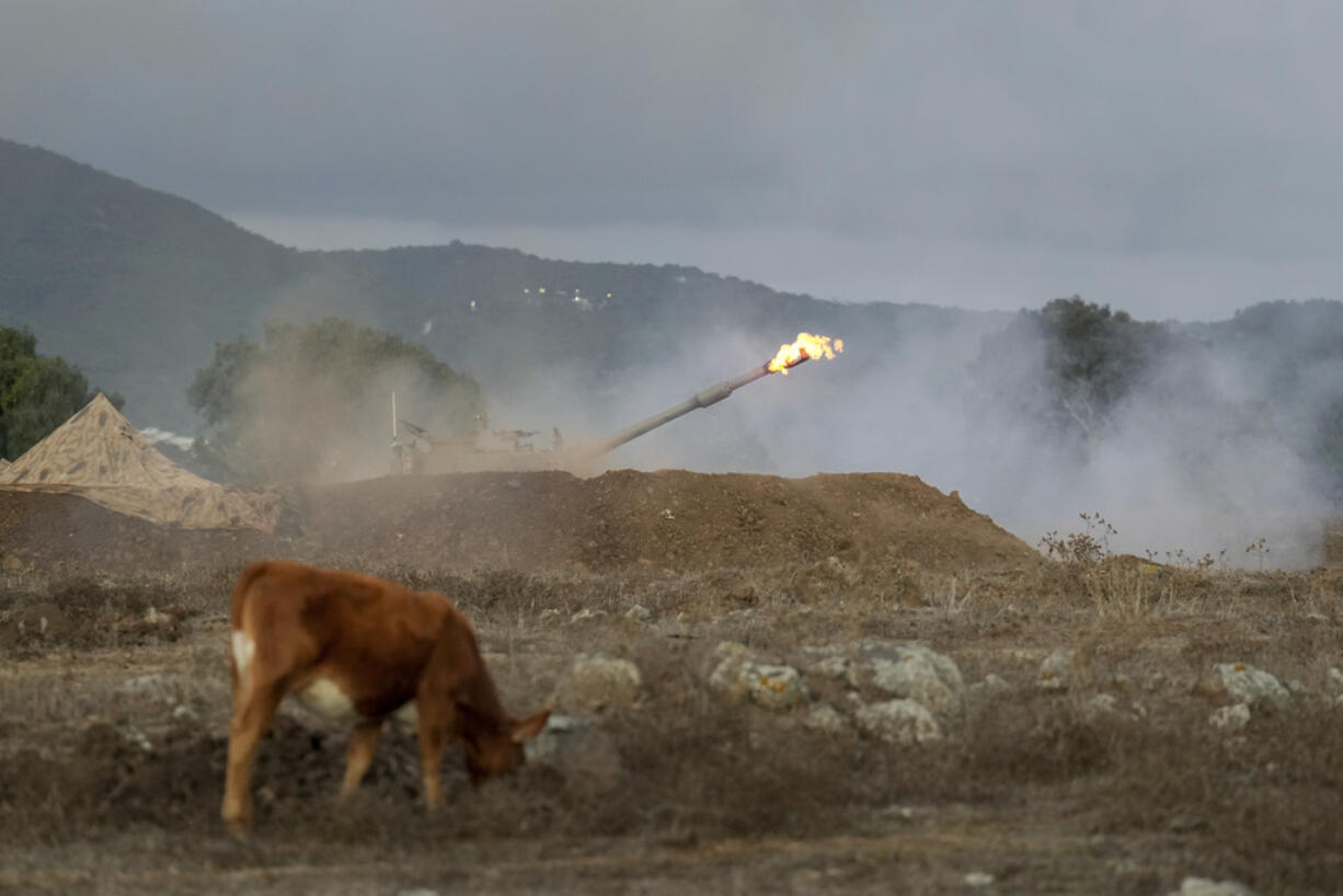 An Israeli mobile artillery unit fires a shell from northern Israel towards Lebanon, Wednesday, Oct. 2, 2024.