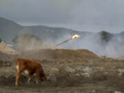 An Israeli mobile artillery unit fires a shell from northern Israel towards Lebanon, Wednesday, Oct. 2, 2024.