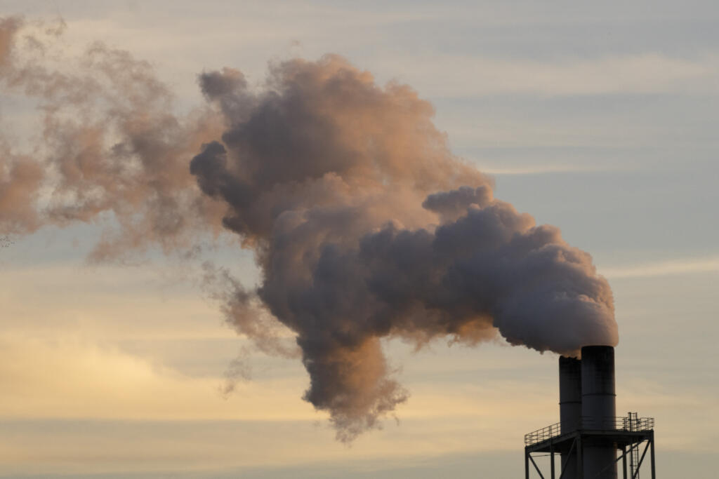 Steam billows from the Longview WestRock mill, which makes cardboard materials including container board and corrugated containers, March 14, 2024, in Longview, Wash.