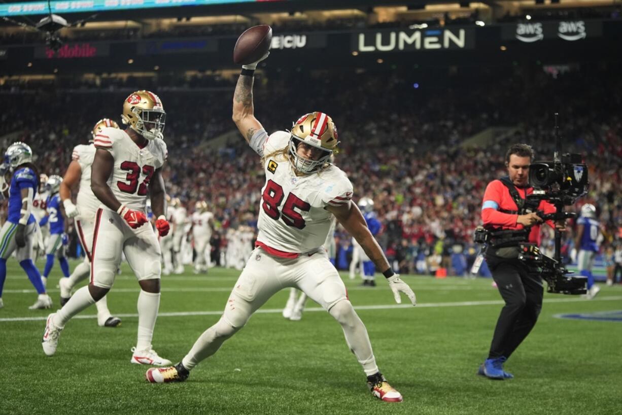 San Francisco 49ers' George Kittle (85) reacts after a touchdown against the Seattle Seahawks, Thursday, Oct. 10, 2024, in Seattle.