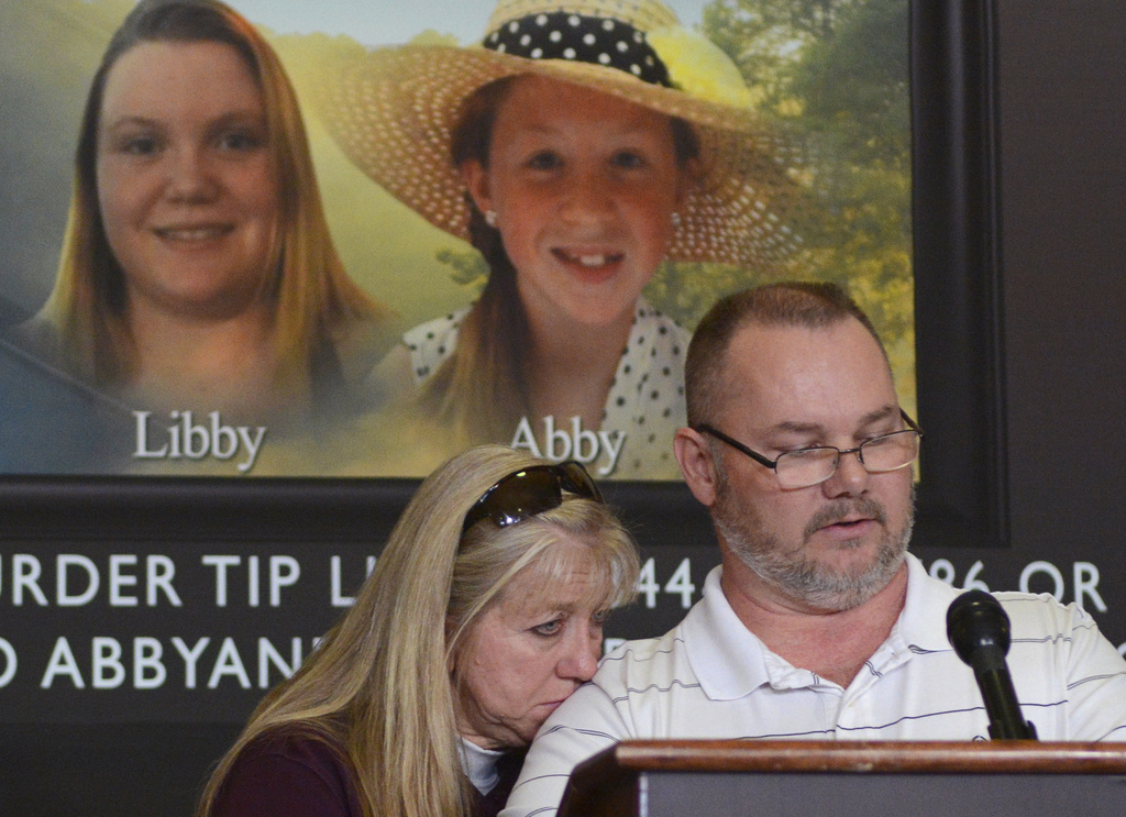 FILE - Grandparents of victim Libby German, Becky Patty, left, and her husband Mike Patty, speak during a news conference for the latest updates on the investigation of the double homicide of Liberty German and Abigail Williams on Thursday, March 9, 2017, at Carroll County Courthouse in Delphi, Ind. (J.