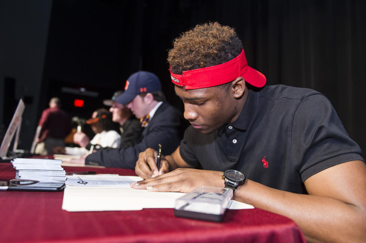 The time-honored tradition of high school athletes proudly sitting behind a table and signing a national letter of intent is a thing of the past. In its place starting next month, athletes will ink their name to financial aid packages that will likely be tied to a revenue-sharing contract.