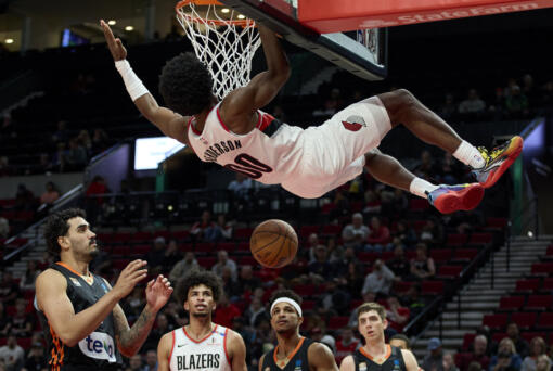 Portland Trail Blazers guard Scoot Henderson dunks during the second half of a preseason NBA basketball game against Ratiopharm Ulm in Portland, Ore., Wednesday, Oct. 16, 2024. (AP Photo/Craig Mitchelldyer)