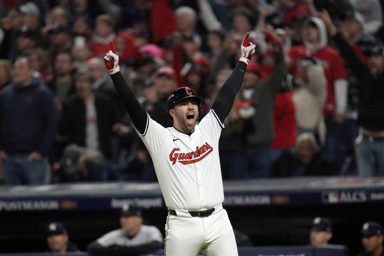 Cleveland Guardians' David Fry celebrates after hitting a game-winning two-run home run against the New York Yankees during the 10th inning in Game 3 of the baseball AL Championship Series Thursday, Oct. 17, 2024, in Cleveland. The Guardians won 7-5.