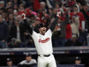 Cleveland Guardians' David Fry celebrates after hitting a game-winning two-run home run against the New York Yankees during the 10th inning in Game 3 of the baseball AL Championship Series Thursday, Oct. 17, 2024, in Cleveland. The Guardians won 7-5.