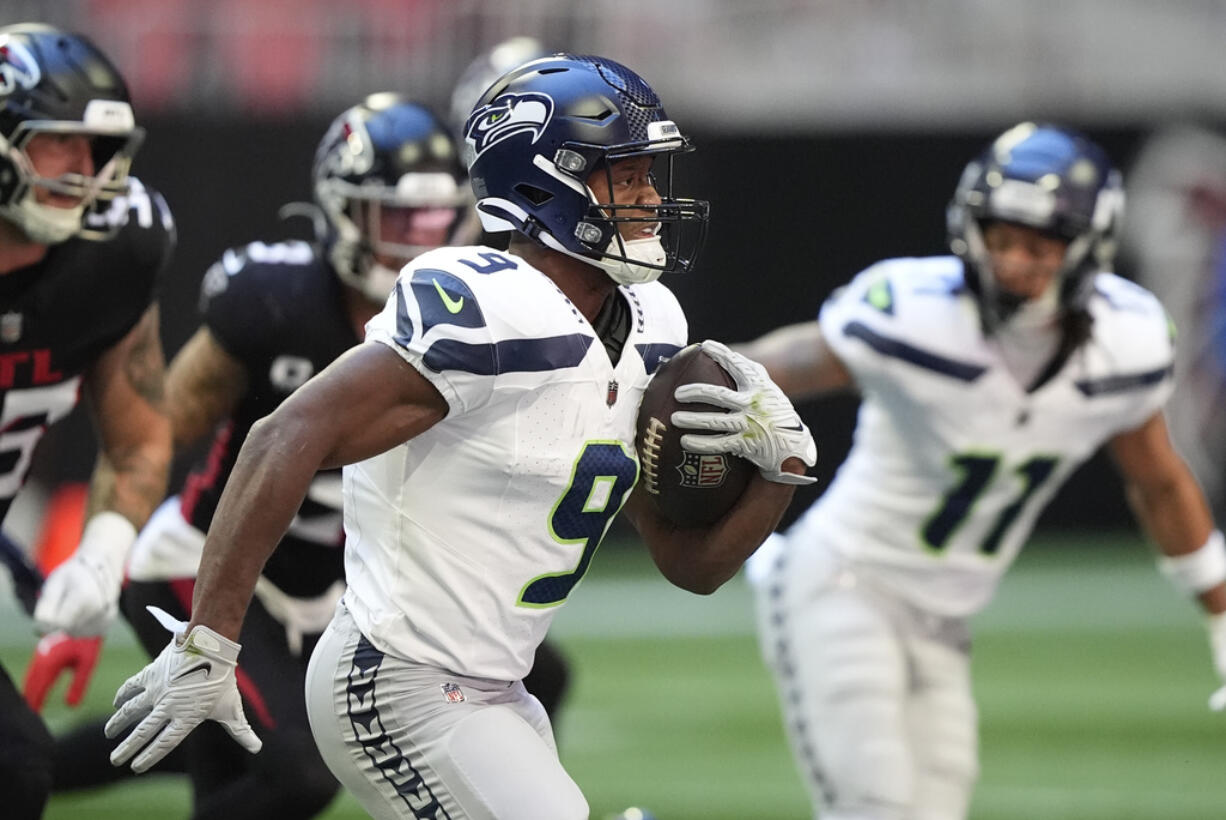 Seattle Seahawks running back Kenneth Walker III (9) had 14 carries for 69 yards and a touchdown against the Atlanta Falcons, on Sunday, Oct. 20, 2024, at Atlanta.