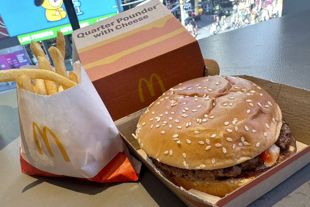 A McDonald's Quarter Pounder hamburger and fries are shown in this photograph, in New York's Times Square, Wednesday, Oct. 23, 2024.