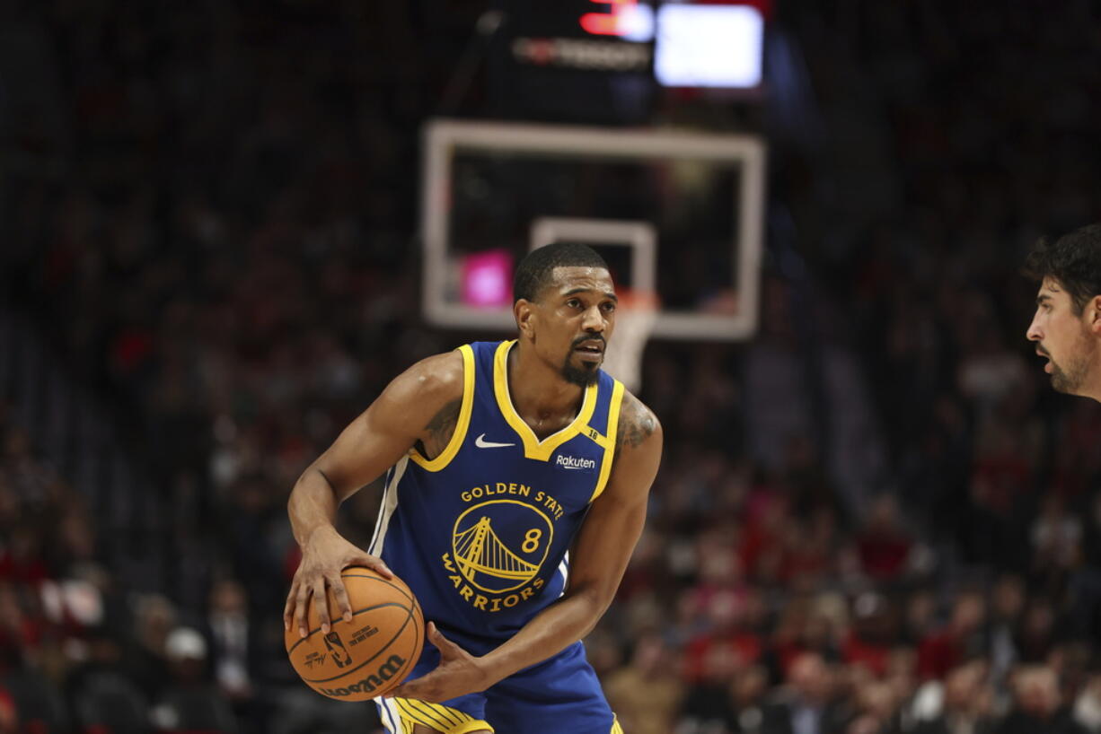 Golden State Warriors guard De'Anthony Melton (8) plays during an NBA basketball game against the Portland Trail Blazers Wednesday, Oct. 23, 2024, in Portland, Ore. The Golden State Warriors won 139-104.