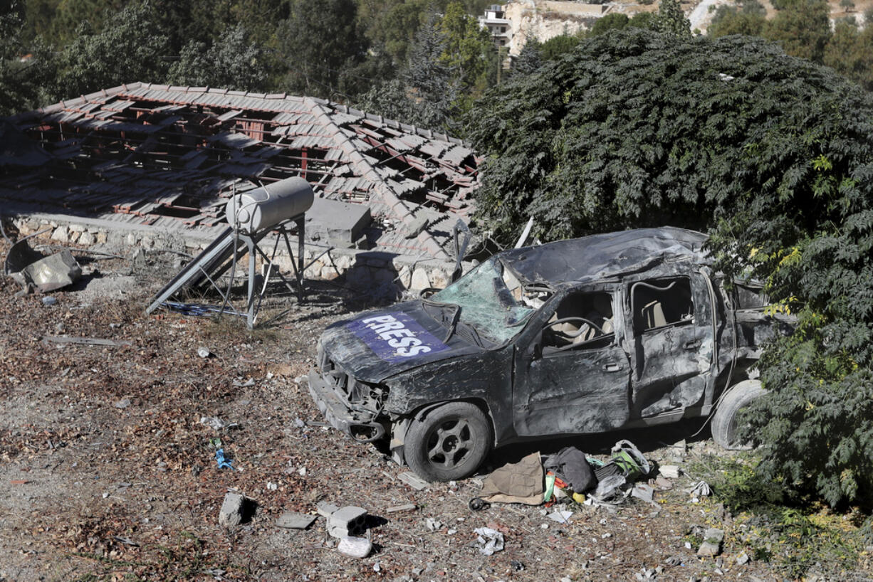 A destroyed journalists' car at the site where an Israeli airstrike hit a compound housing journalists, killing three media staffers from two different news agencies according to Lebanon's state-run National News Agency, in Hasbaya village, southeast Lebanon, Friday, Oct. 25, 2024.