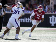 Indiana quarterback Tayven Jackson (2) runs during the first half of an NCAA college football game against the Washington, Saturday, Oct. 26, 2024, in Bloomington, Ind.