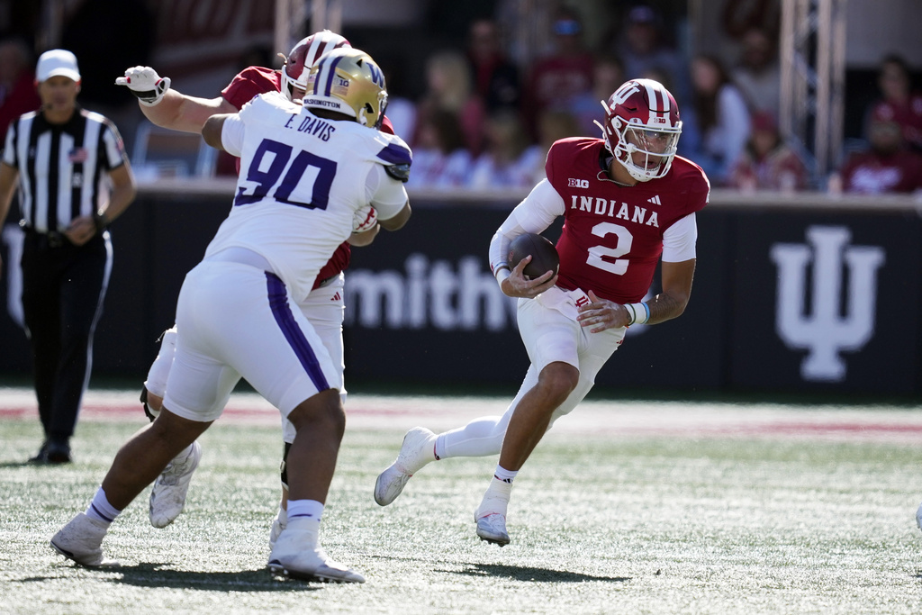 Indiana quarterback Tayven Jackson (2) runs during the first half of an NCAA college football game against the Washington, Saturday, Oct. 26, 2024, in Bloomington, Ind.