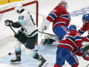 Seattle Kraken's Brandon Montour (62) scores on Montreal Canadiens goaltender Cayden Primeau (30) during the second period of an NHL hockey game in Montreal, Tuesday, Oct. 29, 2024.