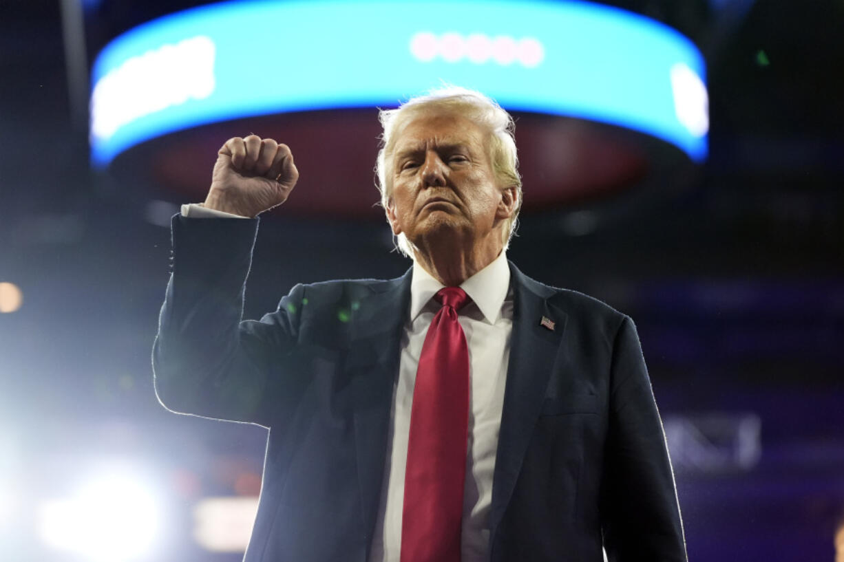 Republican presidential nominee former President Donald Trump gestures at a campaign rally at the Santander Arena, Wednesday, Oct. 9, 2024, in Reading, Pa.