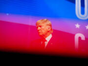 Republican presidential nominee former President Donald Trump stands on stage after speaking during a campaign rally at Thomas &amp; Mack Center, Thursday, Oct. 24, 2024, in Las Vegas.