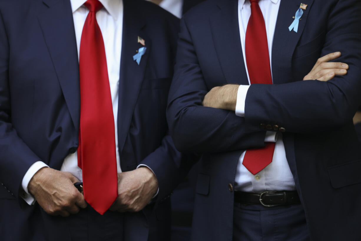 Republican presidential nominee former President Donald Trump, left, and Republican vice presidential nominee Sen. JD Vance, R-Ohio, attend the 9/11 Memorial ceremony on the 23rd anniversary of the Sept. 11, 2001 attacks, Wednesday, Sept. 11, 2024, in New York.