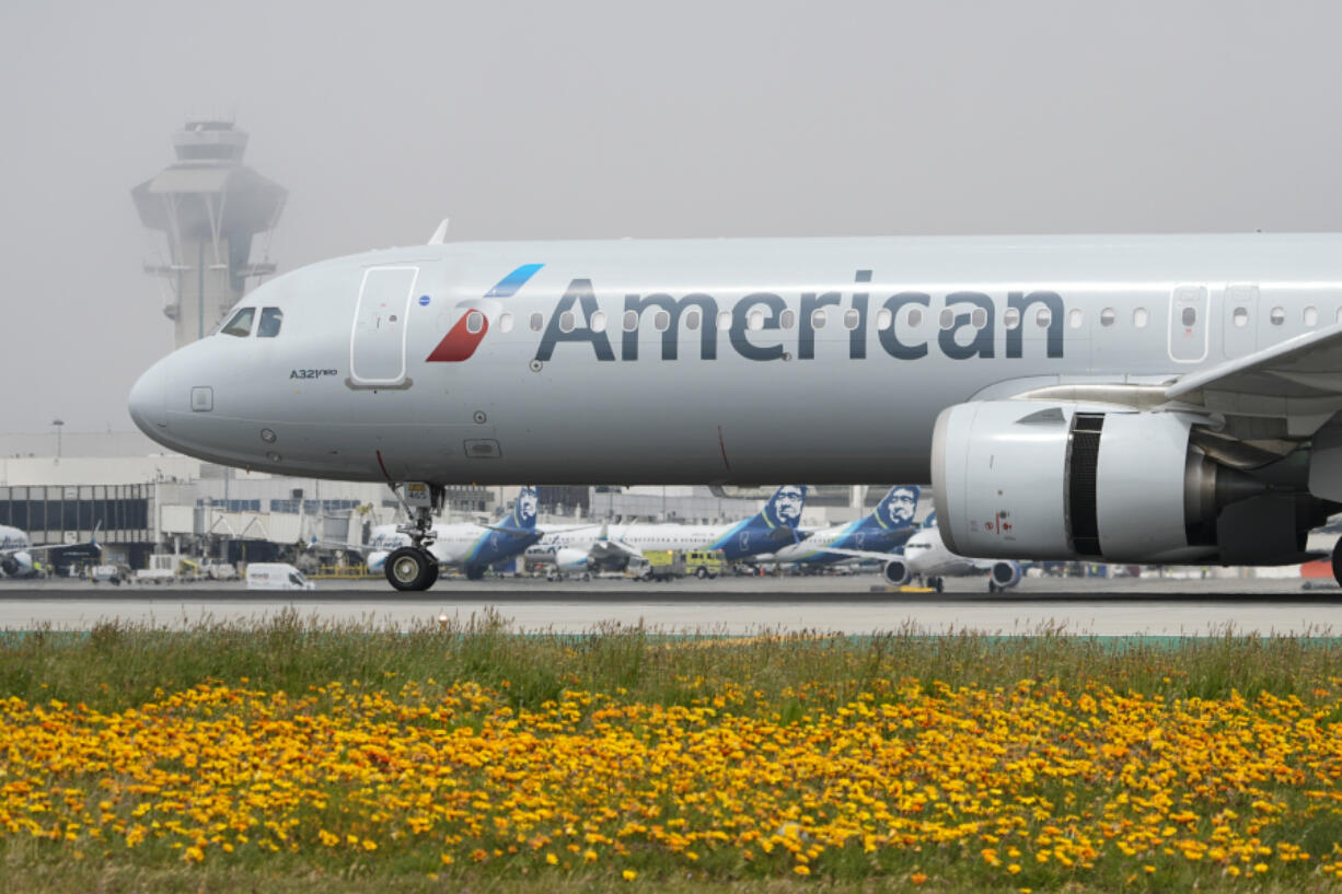 FILE - An American Airlines jet taxis at the Los Angeles International Airport in Los Angeles on April 12, 2024.