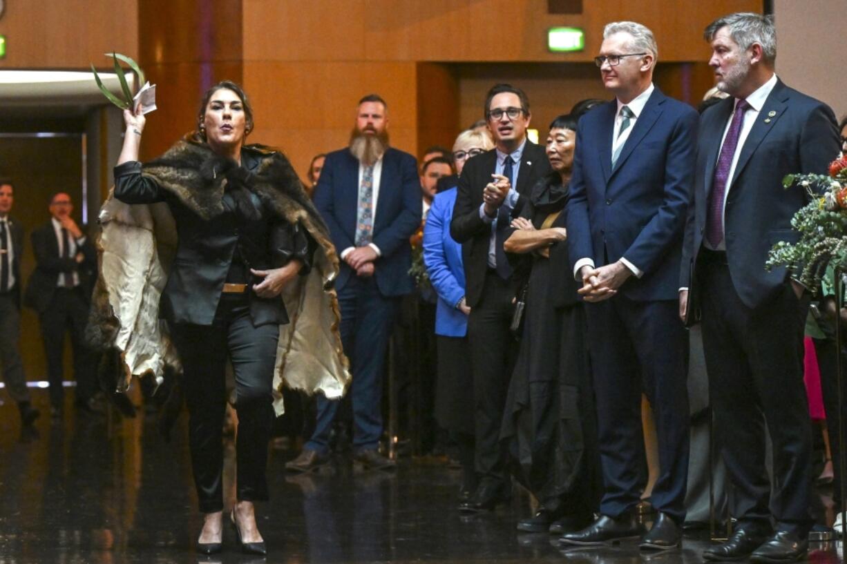 Australian Senator Lidia Thorpe, left, disrupts proceedings as Britain&rsquo;s King Charles and Queen Camilla attend a Parliamentary reception hosted by Australian Prime Minister Anthony Albanese and partner Jodie Jaydon at Parliament House in Canberra, Australia, Monday, Oct. 21, 2024.