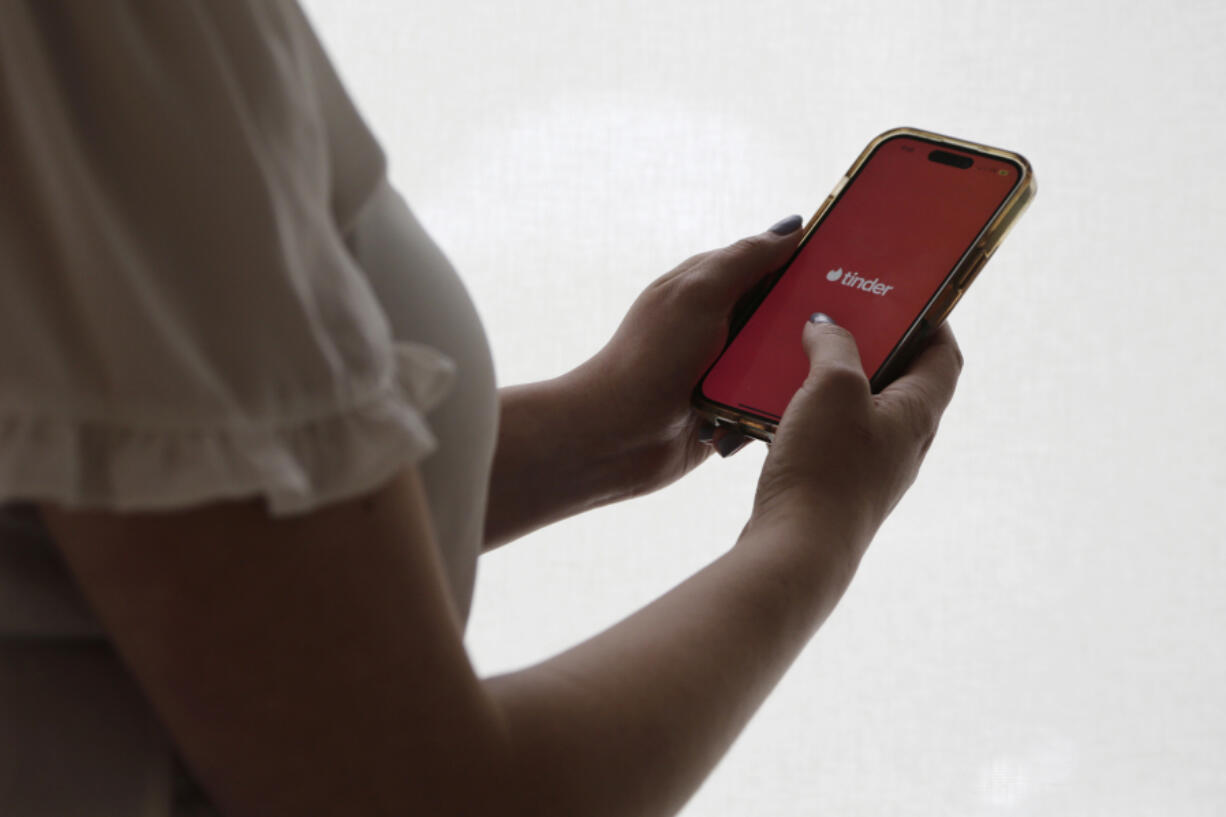 FILE - The dating app Tinder is shown on a smartphone on June 26, 2024, in New York.