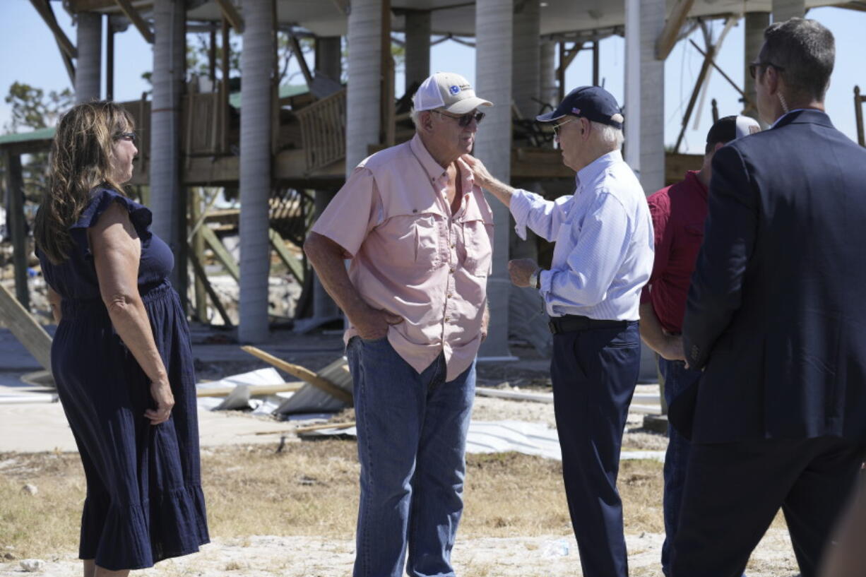 President Joe Biden greets people in Keaton Beach, Fla., Thursday, Oct. 3, 2024, during his tour of areas impacted by Hurricane Helene.