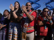 Attendees applaud during Friday&rsquo;s event with President Joe Biden at the Gila Crossing Community School in the Gila River Indian Community reservation.