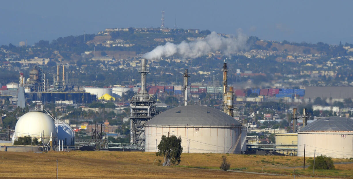 FILE - The Phillips 66 refinery is shown, July 16, 2014 in the Wilmington area of Los Angeles. (AP Photo/Mark J.