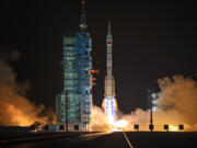 A Long March rocket with a Shenzhou-19 spacecraft atop takes off from the Jiuquan Satellite Launch Center in Jiuquan, northwestern China in the early hours of Wednesday, Oct. 30, 2024.