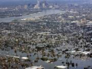 FILE - Floodwaters from Hurricane Katrina cover a portion of New Orleans on Aug. 30, 2005. (AP Photo/David J.