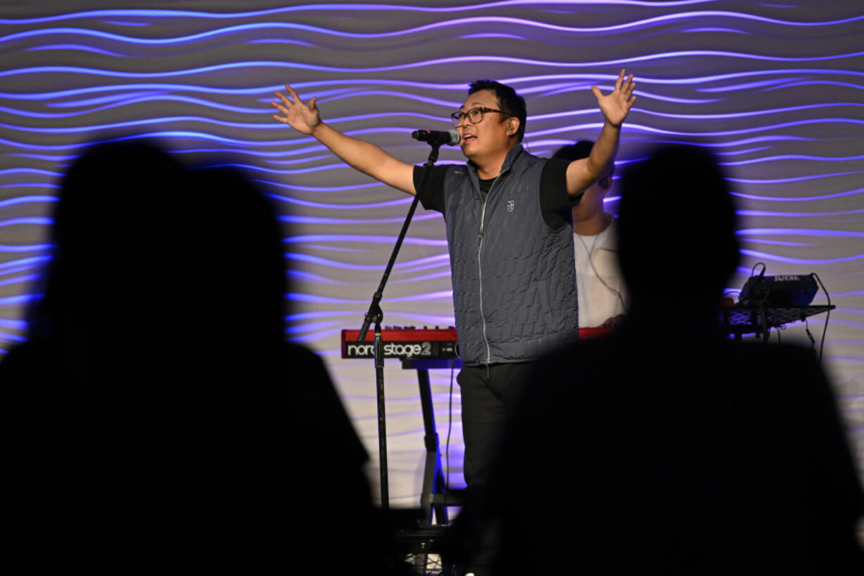 Sun Young sings during a service Oct. 13 at the Christ Central Presbyterian Church in Centreville, Pa.