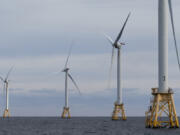 FILE - Turbines operate at the Block Island Wind Farm, Dec. 7, 2023, off the coast of Block Island, R.I.