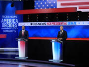 Republican vice presidential nominee Sen. JD Vance, R-Ohio, and Democratic vice presidential nominee Minnesota Gov. Tim Walz, participate in a vice presidential debate hosted by CBS News in New York, Tuesday, Oct. 1, 2024.