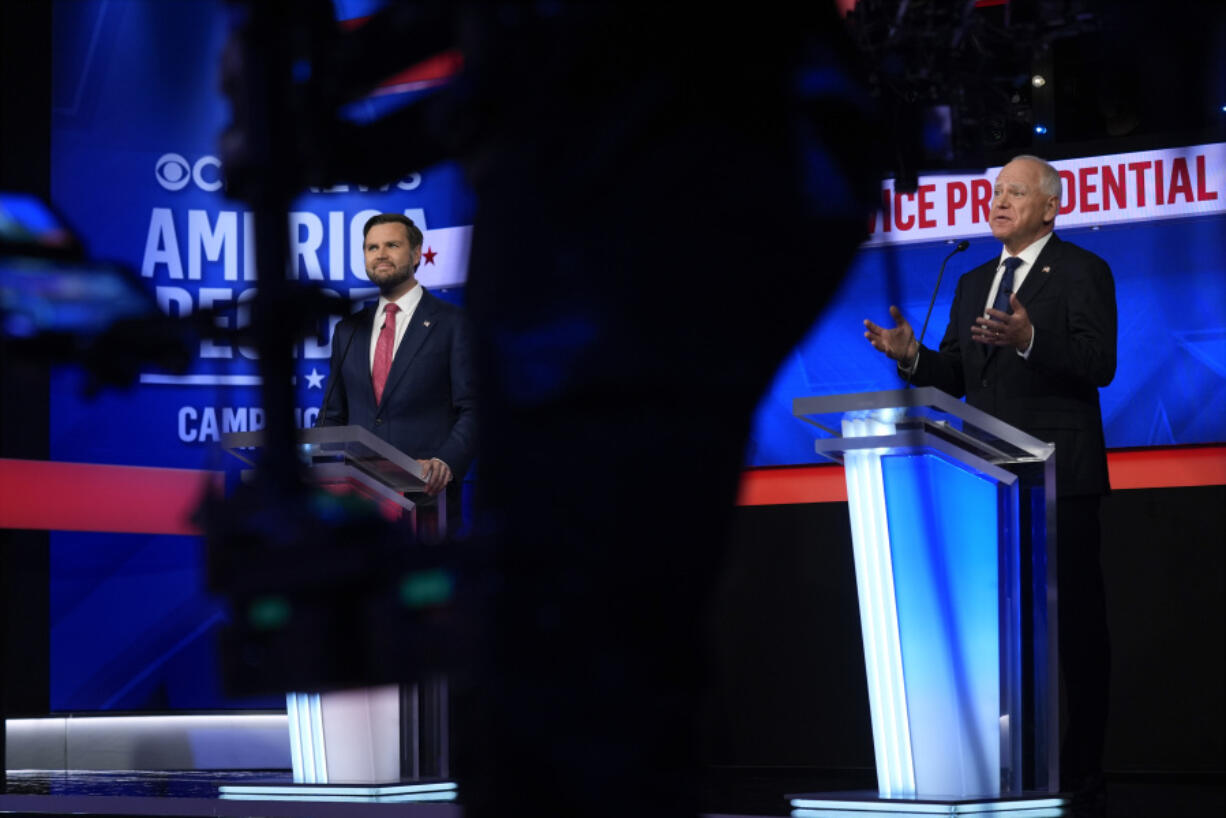 Democratic vice presidential nominee Minnesota Gov. Tim Walz speaks during a vice presidential debate hosted by CBS News, with Republican vice presidential nominee Sen. JD Vance, R-Ohio, Tuesday, Oct. 1, 2024, in New York.