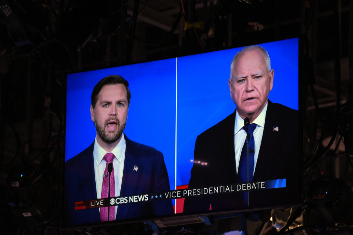 AS seen on a monitor in the studio, Republican vice presidential nominee Sen. JD Vance, R-Ohio, speaks during a vice presidential debate hosted by CBS News, with Democratic vice presidential candidate Minnesota Gov. Tim Walz, Tuesday, Oct. 1, 2024, in New York.