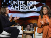 FILE - Democratic presidential nominee Vice President Kamala Harris, left, joins Oprah Winfrey at Oprah&rsquo;s Unite for America Live Streaming event Sept. 19, 2024 in Farmington Hills, Mich.