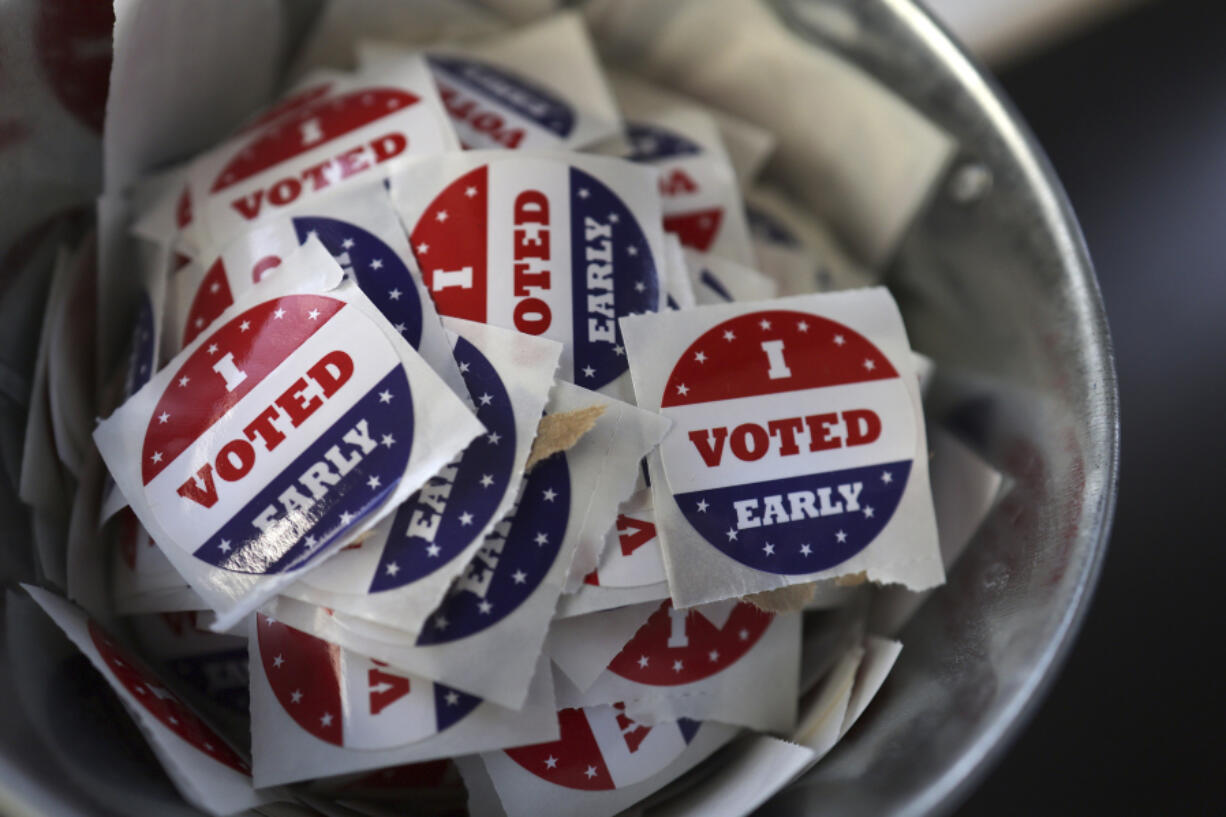 &ldquo;I Voted Early&rdquo; stickers sit in a bucket by the ballot box Sept. 19 at the city of Minneapolis early voting center in St. Paul, Minn.