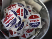 &ldquo;I Voted Early&rdquo; stickers sit in a bucket by the ballot box Sept. 19 at the city of Minneapolis early voting center in St. Paul, Minn.