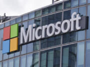 FILE - The Microsoft logo in Issy-les-Moulineaux, outside Paris, France, April 12, 2016. The company said Wednesday that Russian operatives are doubling down on fake videos to smear Vice President Kamala Harris&rsquo; campaign, while Chinese-linked social media campaigns are maligning down-ballot candidates who are critical of China. Meanwhile, Iranian actors who allegedly sent emails aimed at intimidating U.S. voters in 2020 have been surveying election-related websites and major media outlets, the tech giant said.