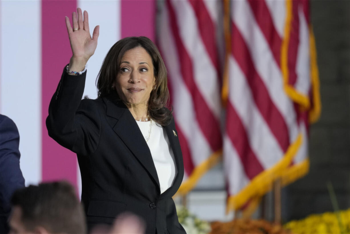 Democratic presidential nominee Vice President Kamala Harris waves as she departs after speaking at a campaign rally at Ripon College, Thursday, Oct. 3, 2024, in Ripon, Wis.