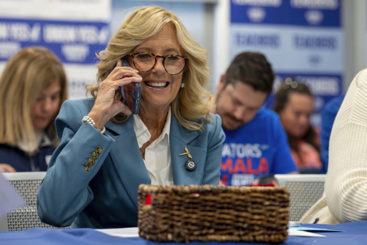 First Lady Jill Biden makes calls to Harris-Walz voters during a visit at a Pennsylvania State Education Association (PSEA) phone bank in West Chester Tuesday. Oct. 15, 2024.