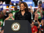 Democratic presidential nominee Vice President Kamala Harris speaks during a campaign rally at the Dort Financial Center in Flint, Mich., Friday, Oct. 4, 2024.