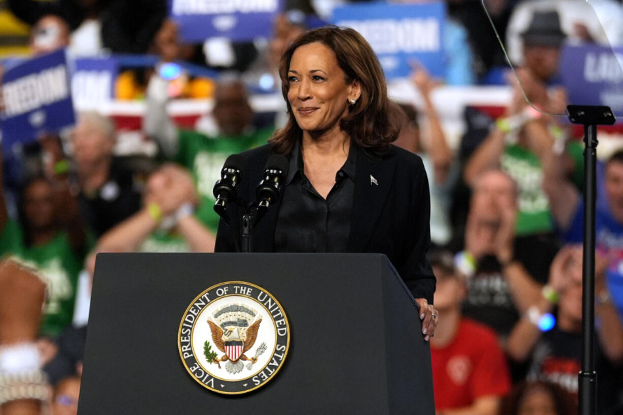 Democratic presidential nominee Vice President Kamala Harris speaks during a campaign rally at the Dort Financial Center in Flint, Mich., Friday, Oct. 4, 2024.