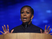 FILE - Former first lady Michelle Obama speaks during the Democratic National Convention Aug. 20, 2024, in Chicago.